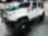1C4BJWEGXCL184557-2012-jeep-wrangler-unlimited-sahara-0
