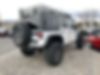 1C4BJWDG6EL156890-2014-jeep-wrangler-unlimited-2