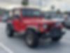 1J4FA39SX4P702220-2004-jeep-wrangler-2