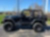 1J4FY29P0XP495567-1999-jeep-wrangler-2