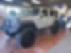 1J4HA6H11BL509820-2011-jeep-wrangler-unlimited-0