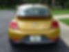 3VWS17AT5GM612769-2016-volkswagen-beetle-coupe-2