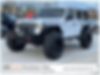 1C4HJXFG9JW165427-2018-jeep-wrangler-unlimited-0
