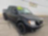 1N6ED0EB2MN700385-2021-nissan-frontier-0