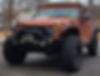 1J4HA3H19BL511944-2011-jeep-wrangler-unlimited-0