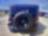 1C4BJWDG7EL295099-2014-jeep-wrangler-unlimited-sport-2