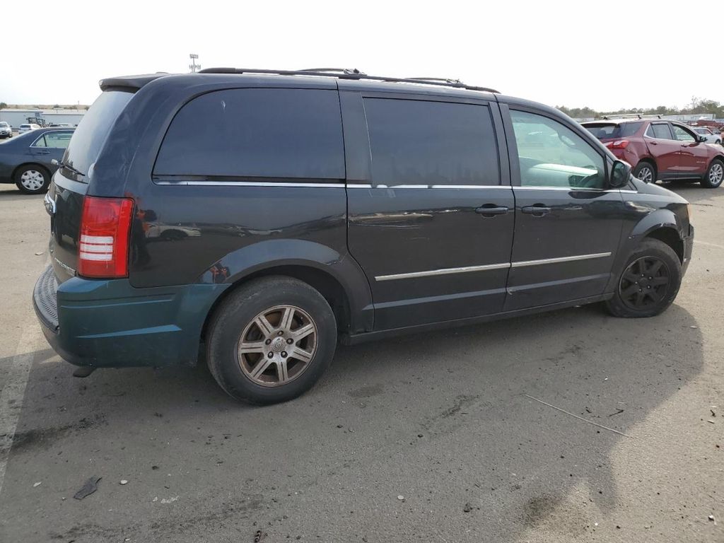2A4RR8DX9AR357469-2010-chrysler-town-and-country-2