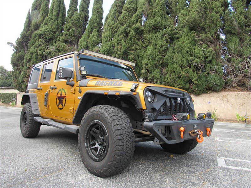 1C4BJWEG0EL220100-2014-jeep-wrangler-sahara